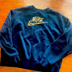 Black Nike sweatshirt with animal print logo